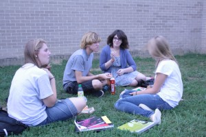 Students picnic on the lawn of the MHC.
