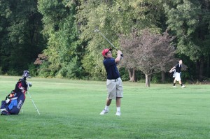 Senior Nick Poudrier takes a swing.